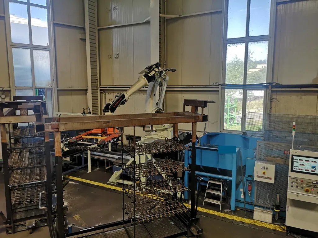 Warenträger und Roboterzelle von oben